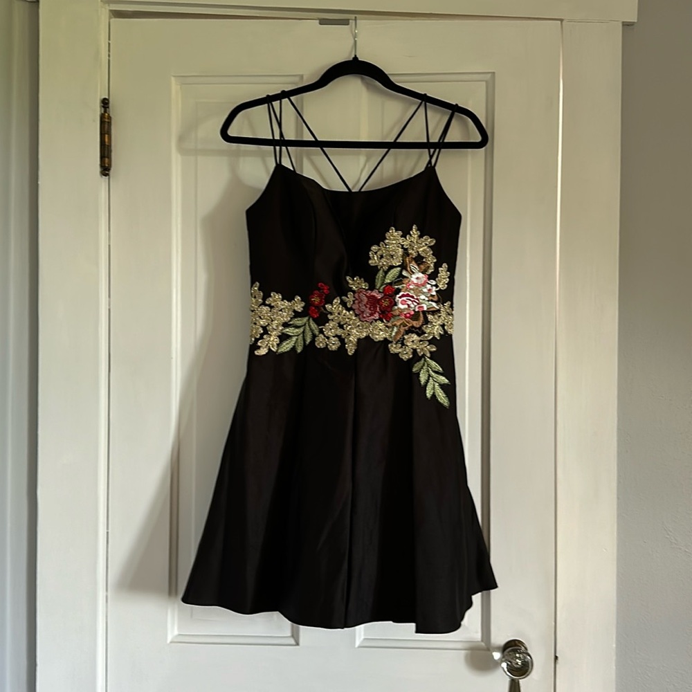 Unique black formal dress! From the brand Blondie nites. Size 5